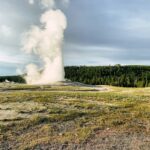 Old Faithful geyser erupting at Yellowstone National Park, representative of Snake River Cabins and RV Village